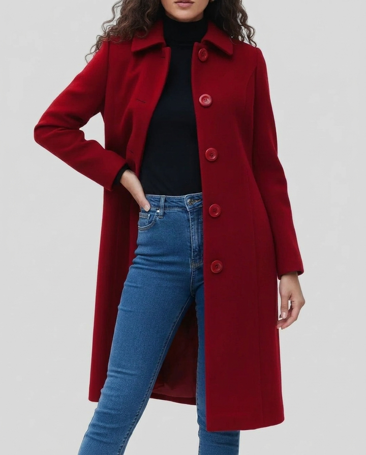 Detailed view of an elegant women's single-breasted long trench coat, highlighting its classic design & fall fashion.