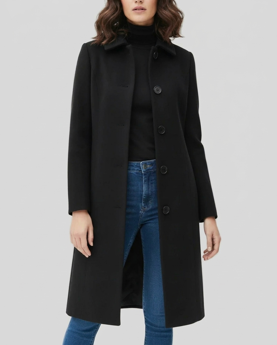 Elegant women's single-breasted long trench coat. Classic style outerwear for sophisticated fall & winter fashion.
