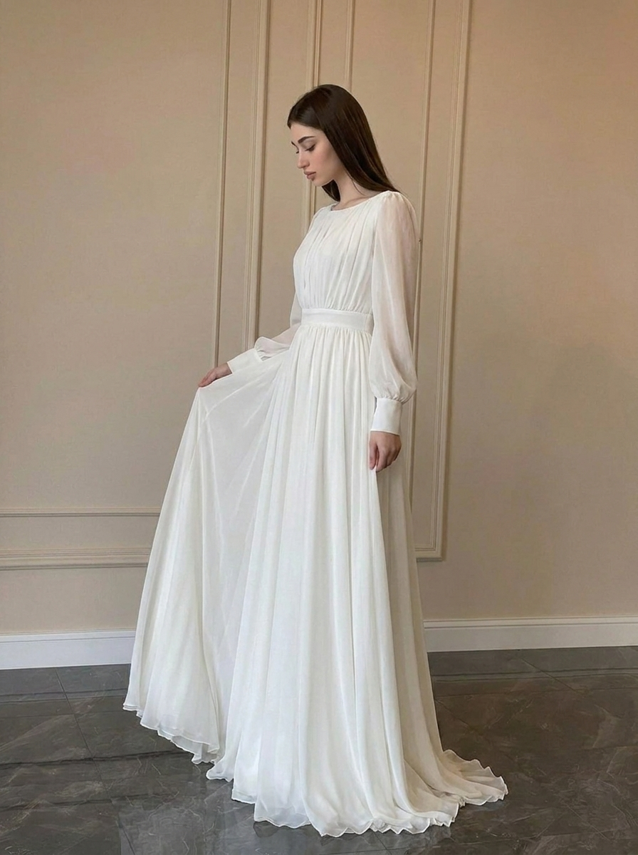 Graceful women's long sleeve maxi wedding dress. Elegant and modest white bridal gown for a classic, sophisticated bride.