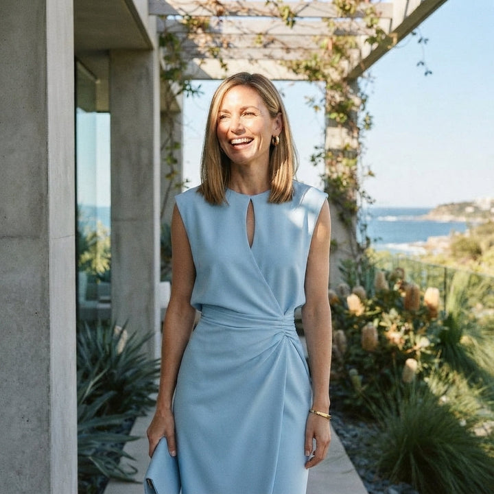 Sophisticated wedding guest midi dress. Women's elegant ruched formal wear, perfect for special occasions.