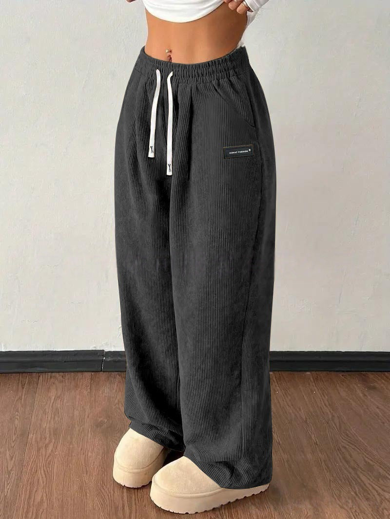 Versatile women's baggy wide leg corduroy pants with pockets, perfect for casual outings & everyday wear.