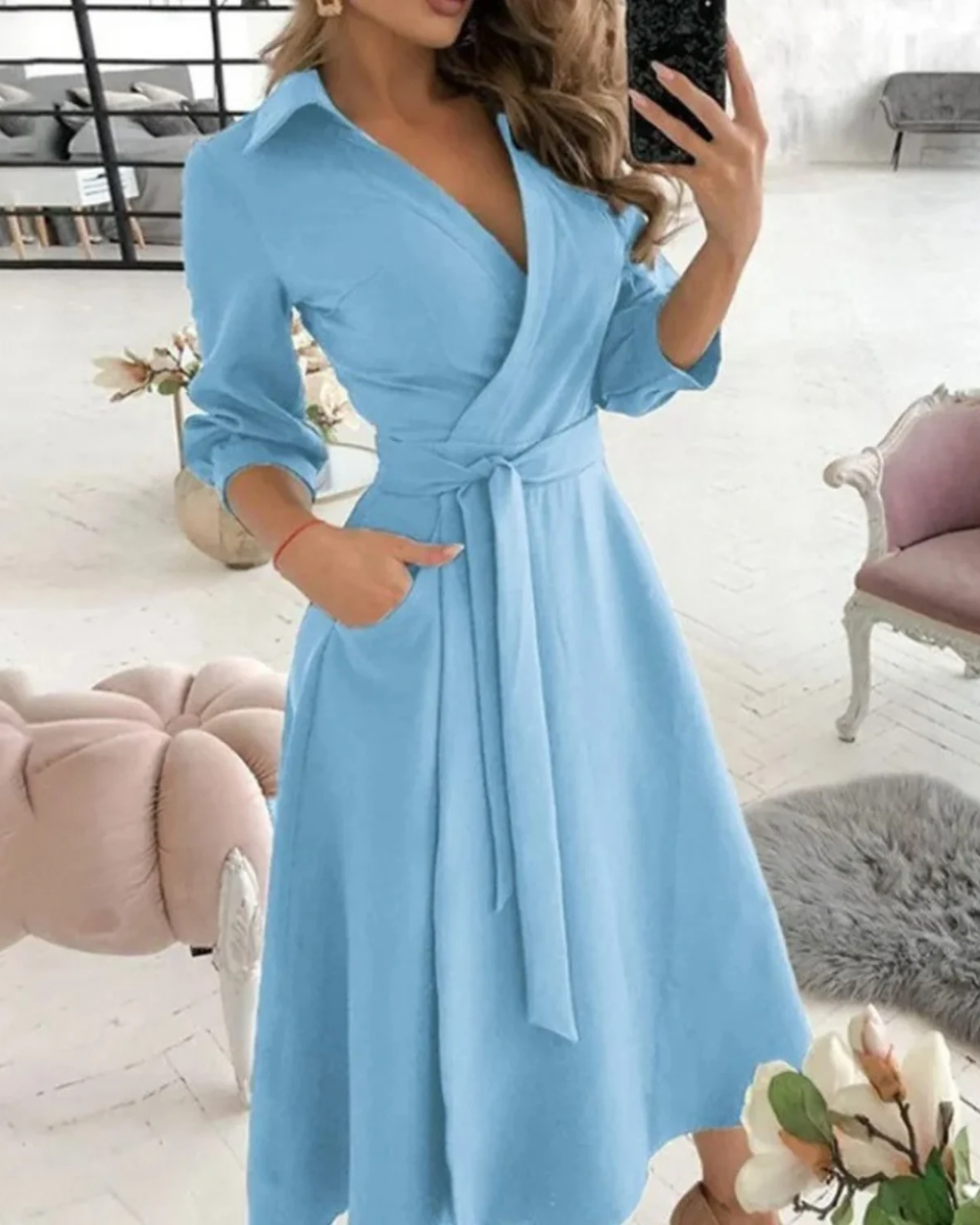 Versatile women's midi wrap dress, ideal for professional office wear & stylish day to night transitions.