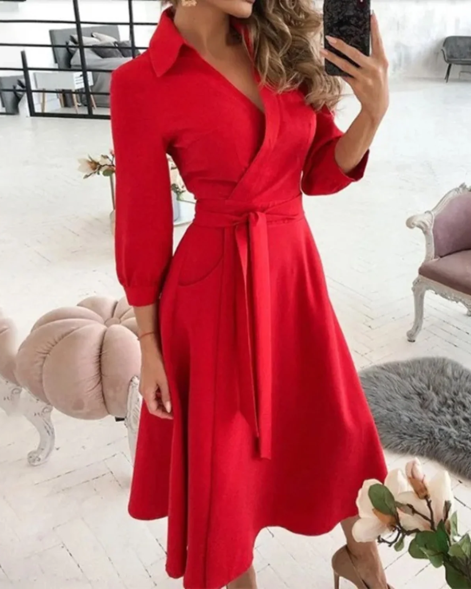 Professional women's work dress: elegant wrap collar, adjustable tie waist, and stylish midi length.