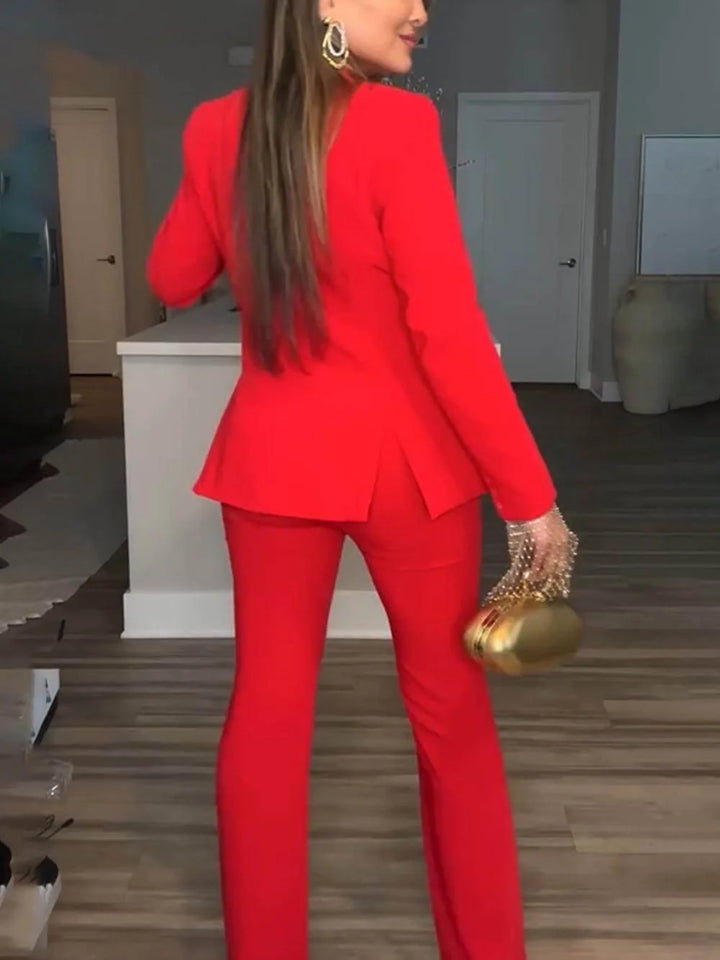 Professional women's power suit blazer and trouser set in a stylish design for sophisticated office wear.