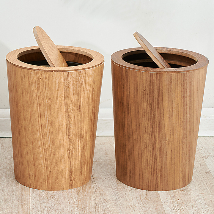 Designer wood trash can with lid, a minimalist and elegant waste bin for stylish homes.