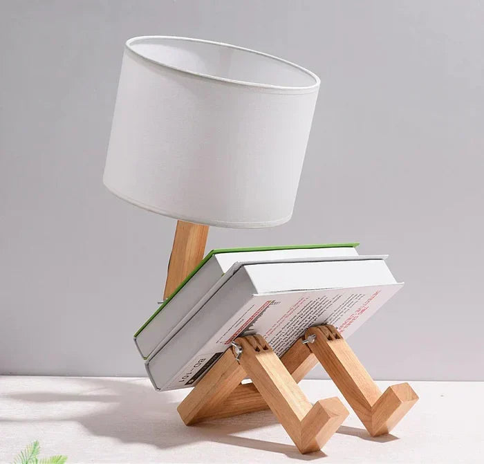 Adjustable wooden robot desk lamp & book holder. A versatile study or office lighting solution with wood design.
