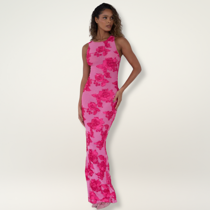 Women's floral sleeveless maxi dress, perfect for summer vacations or elegant spring events. Feminine and comfortable.