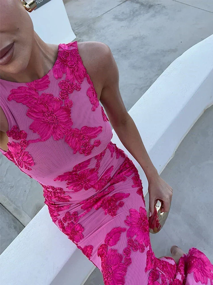 Beautiful floral print women's sleeveless maxi dress, offering a feminine and flowy silhouette for any spring or summer occasion.