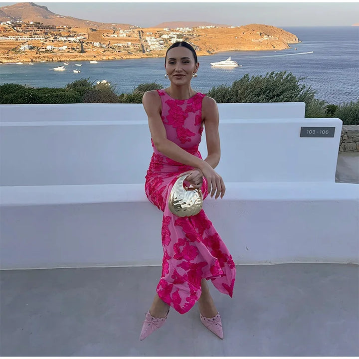 Stylish women's floral sleeveless maxi dress, perfect for spring fashion, beach vacations, or a feminine, elegant outdoor event.