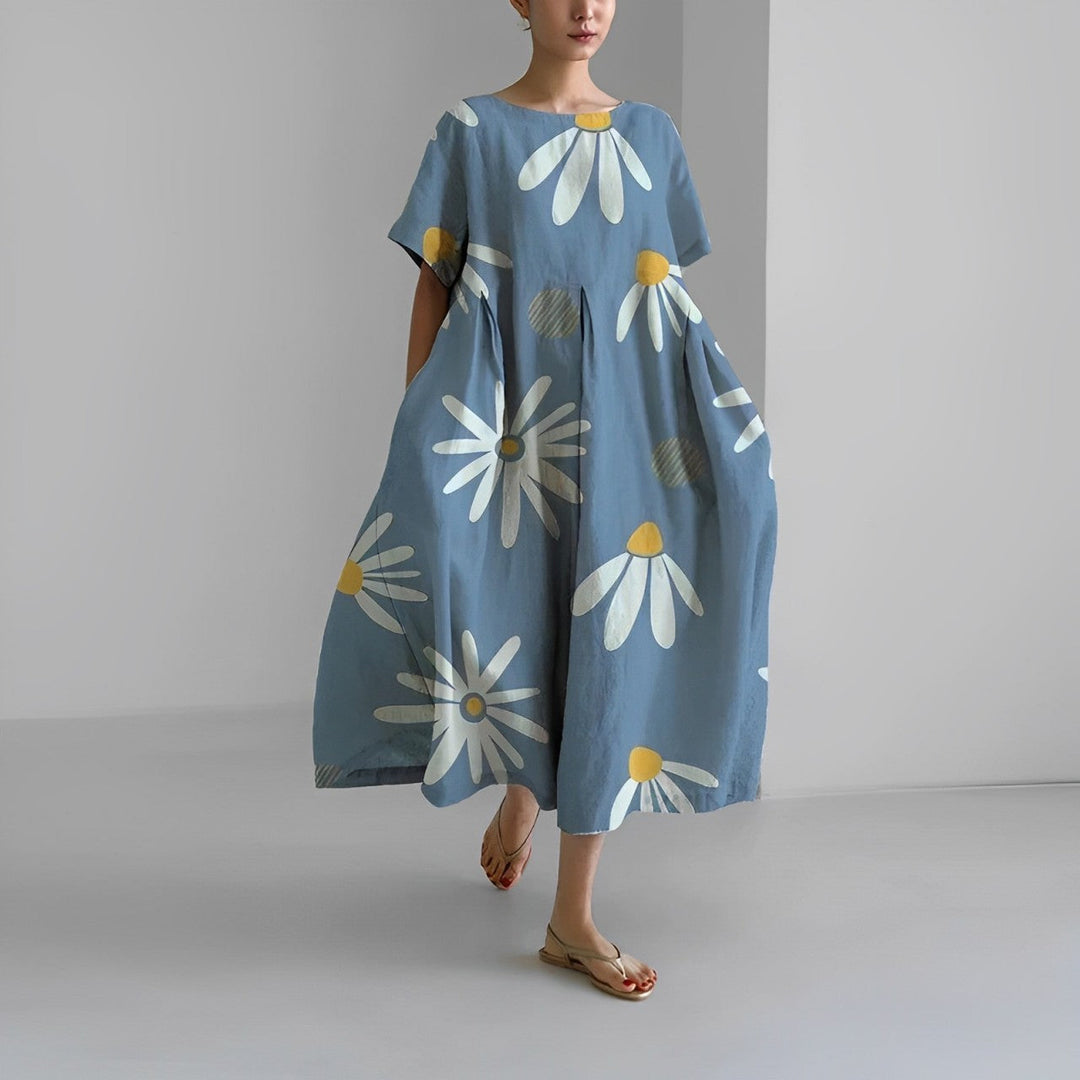 Stunning women's big swing retro maxi dress. Loose, flowy, and vintage inspired for any occasion.