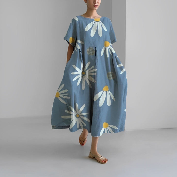 Stunning women's big swing retro maxi dress. Loose, flowy, and vintage inspired for any occasion.