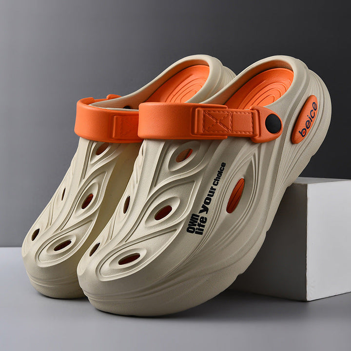 Stylish men's platform clogs with adjustable strap, offering ergonomic comfort & breathability.