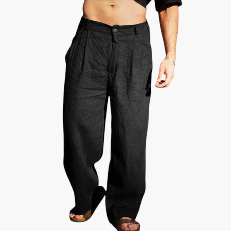 Comfortable men's pleated wide leg linen pants, ideal for relaxed spring and summer outfits.