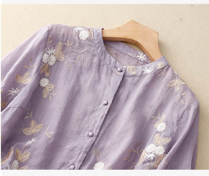 Beautifully embroidered women's blouse with a flowing design, a versatile top for chic and comfortable elegance.