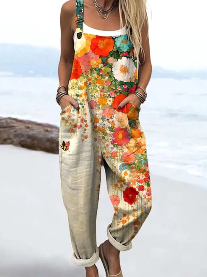 Elegant women's vintage floral wide-leg jumpsuit. Ideal for summer casual wear, vacations & comfortable flowy fashion.