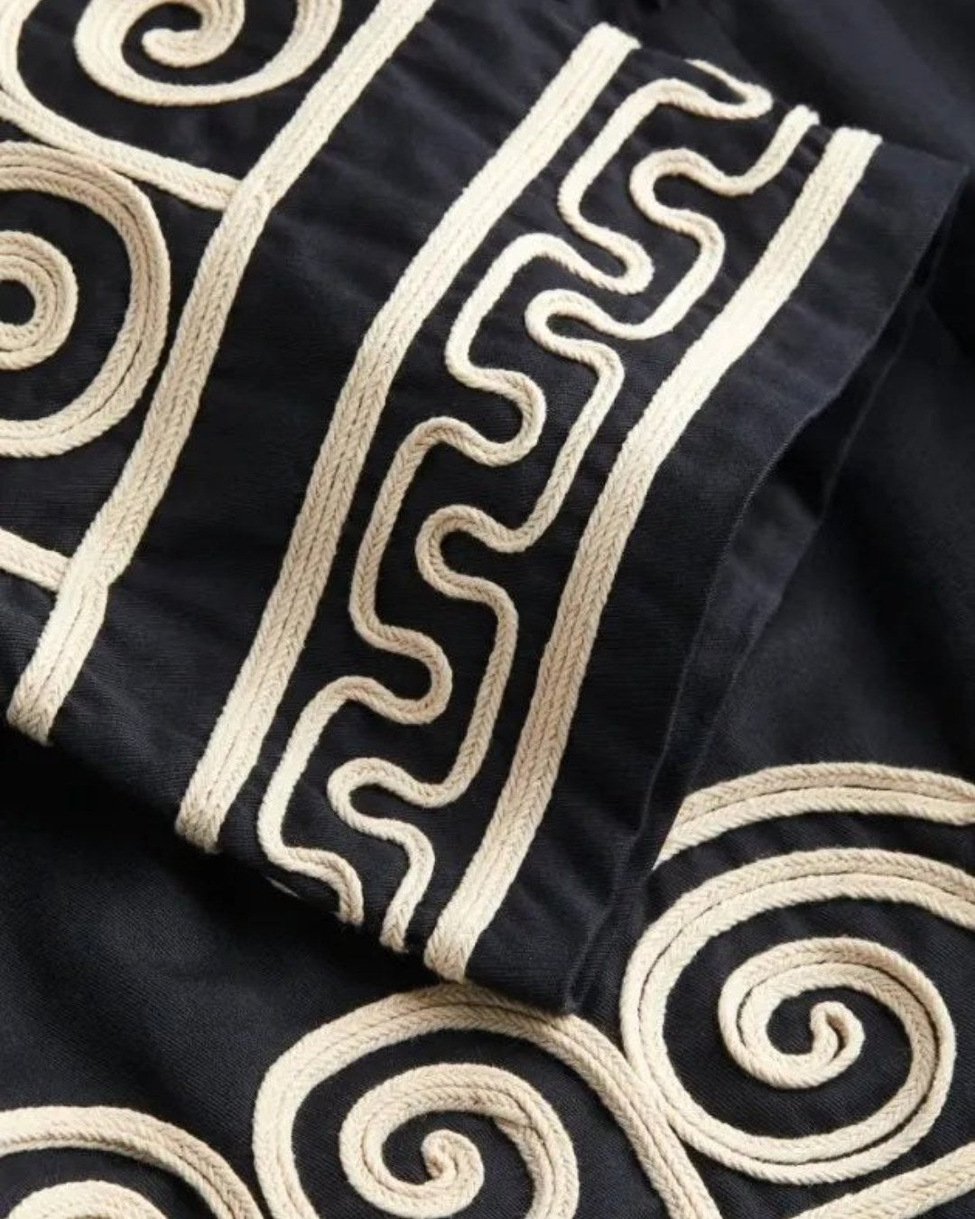 Beautiful women's embroidered maxi dress. Its flowing bohemian style offers comfort for summer and vacation resort wear.
