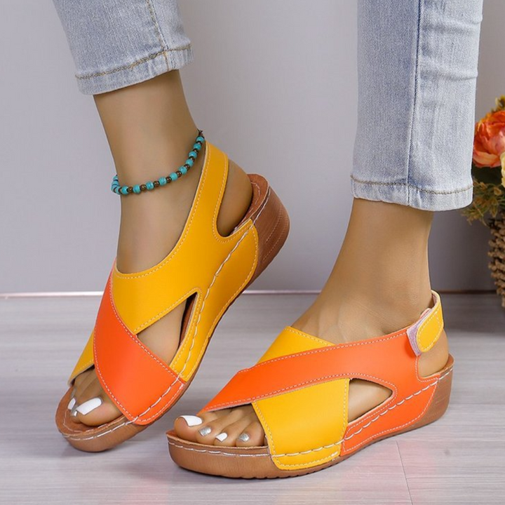 Stylish open-toe Yola sandals for women, offering casual chic comfort. Versatile for everyday summer outfits.