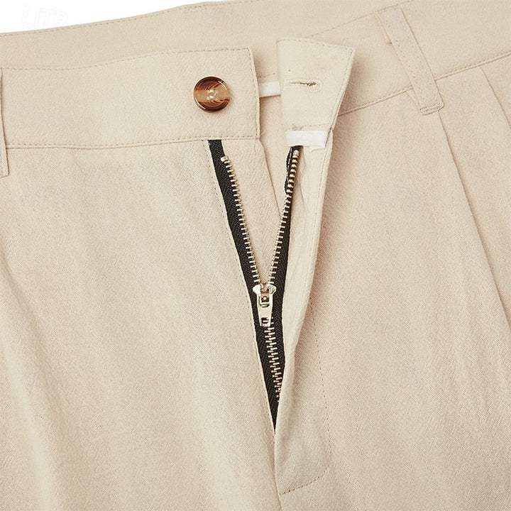 Close-up of lightweight fabric on men's relaxed fit summer trousers, highlighting breathability.