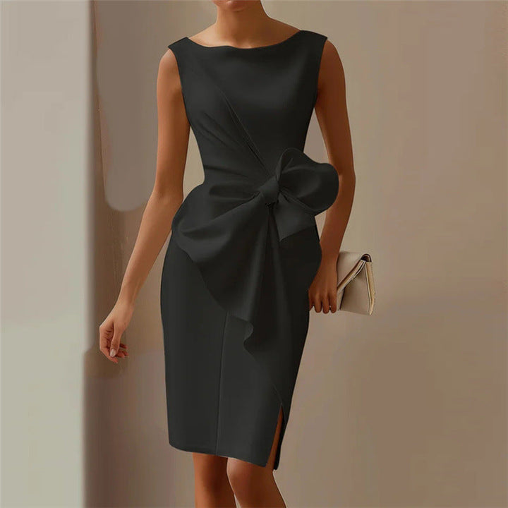 Women's elegant sleeveless midi sheath dress with a refined front bow, perfect for cocktail events.