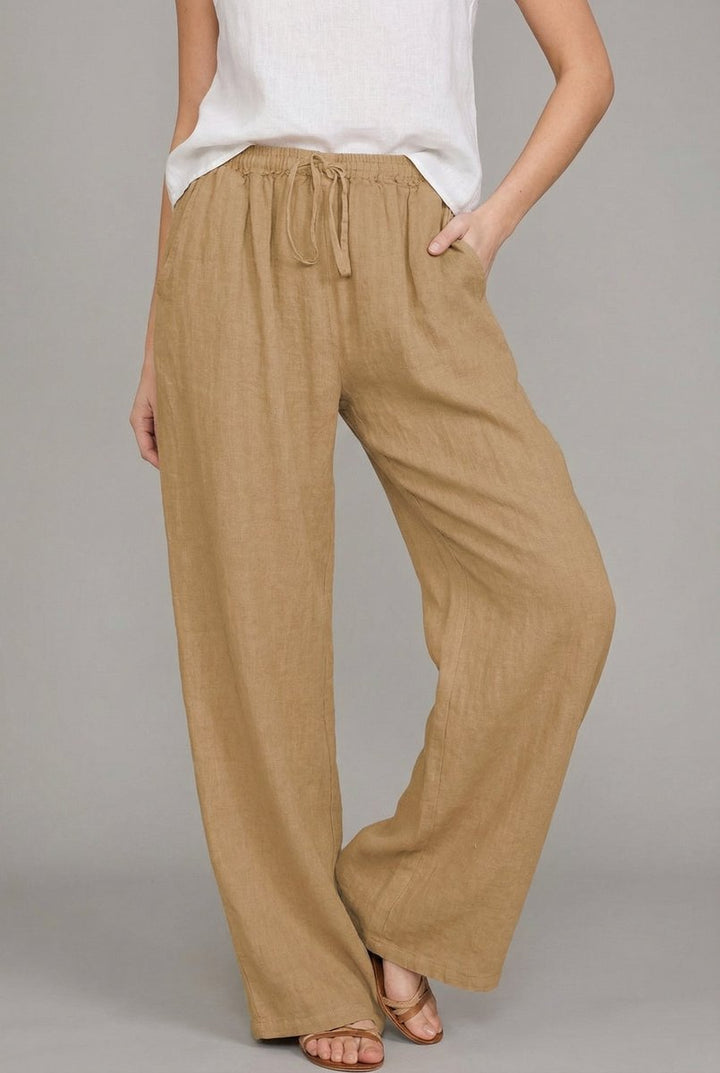 Women's linen wide leg pants with drawstring waist for relaxed, comfortable everyday style.