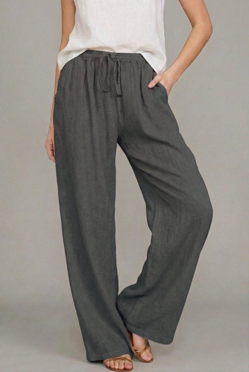 Effortless women's wide leg linen pants with adjustable drawstring, ideal for chic summer and resort wear.