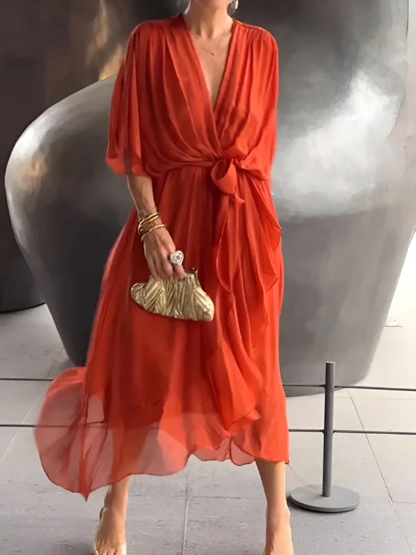 Flattering women's wrap midi dress in a timeless design. Comfortable day-to-evening wear with an elegant V-neck.