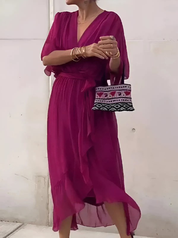 Stylish women's midi wrap dress, suitable for any elegant occasion. Day-to-evening style with a flattering silhouette.