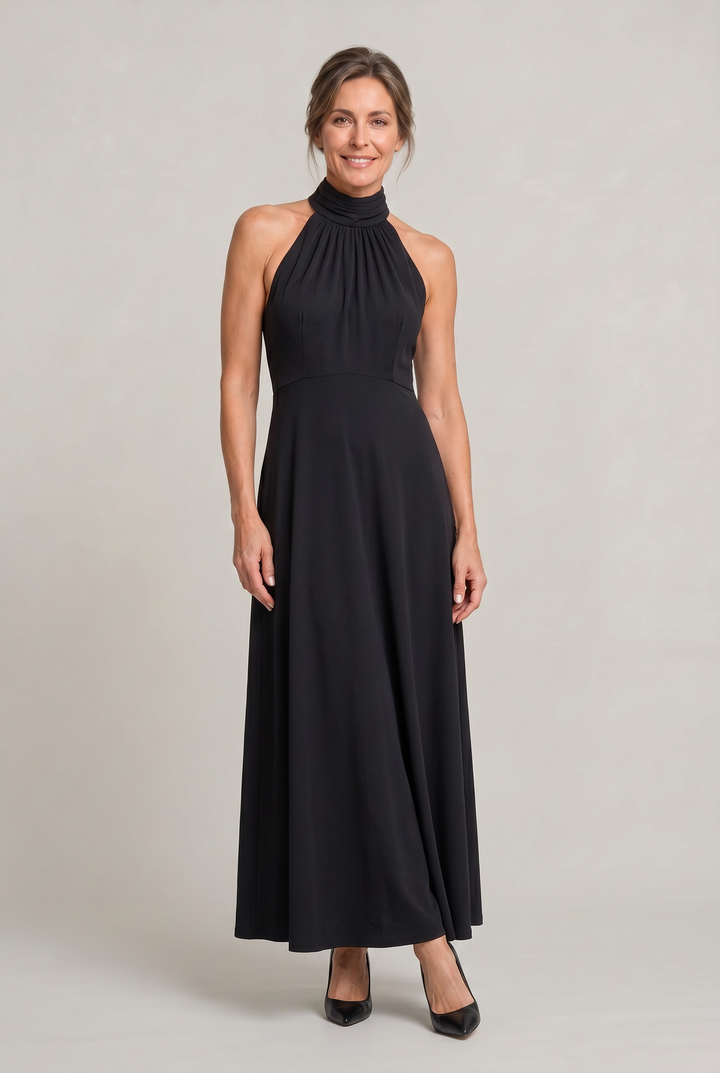 Elegant black halter neck maxi party dress for women. Graceful A-line formal gown perfect for evening events.