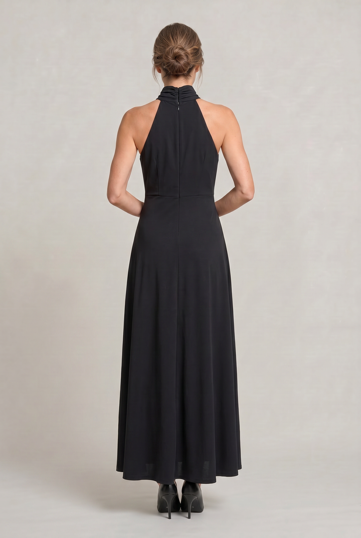 Stylish black maxi party dress for women featuring a chic halter neck. Perfect for formal occasions.
