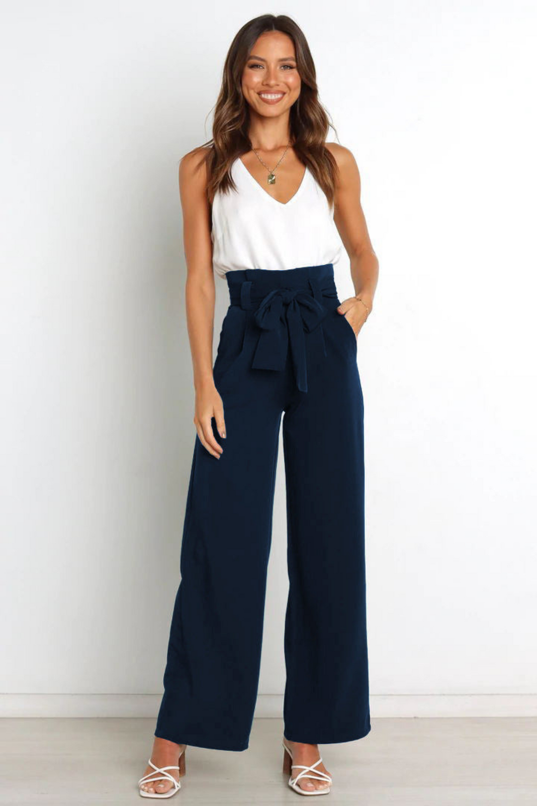 Sophisticated women's wide leg belted linen pants, high waist, comfortable, summer fashion staple.