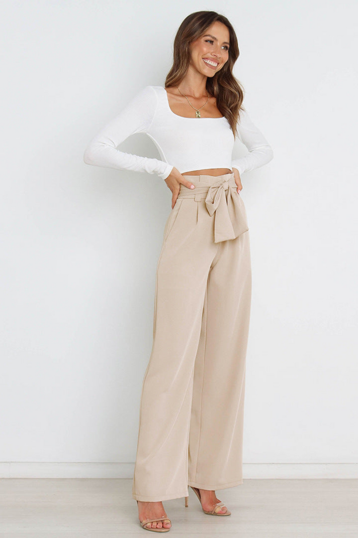 Flowy wide leg belted linen pants for women, versatile, perfect for summer fashion and elegant style.