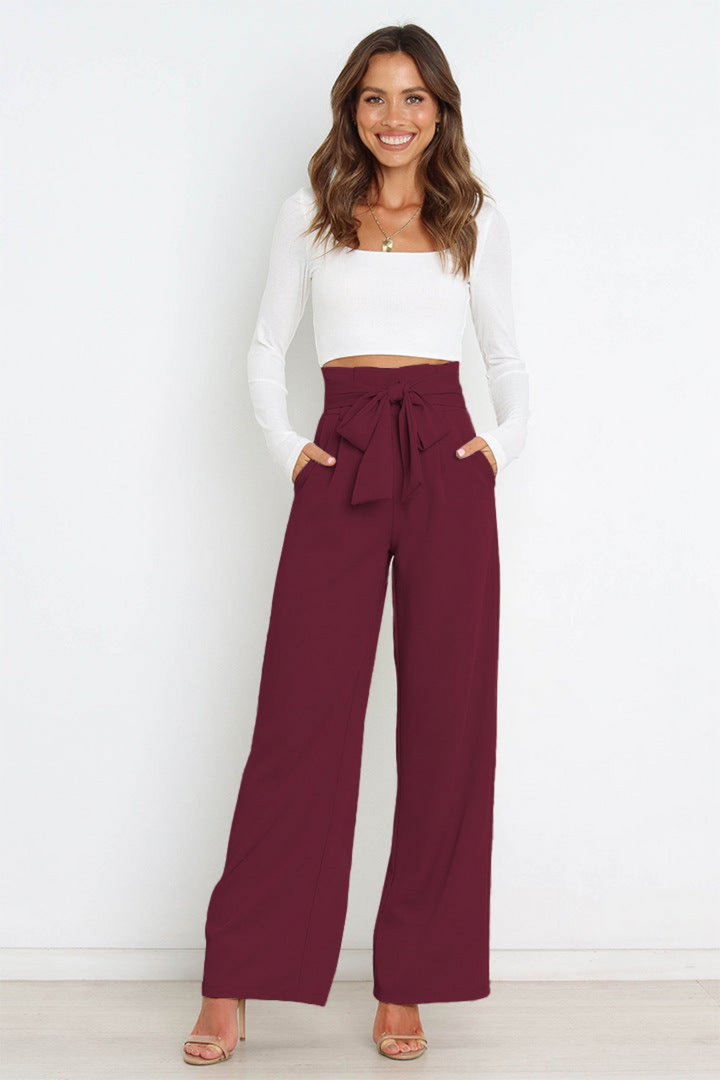 Casual chic women's wide leg linen pants, flowy, high waist, with a stylish belt.