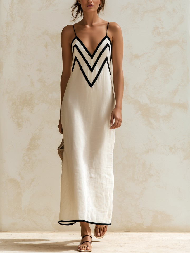 Women's graceful chevron trim maxi slip dress for resort wear. This elegant summer dress is a vacation essential.