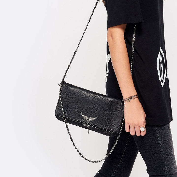 Elegant women's luxury clutch handbag, versatile for evening or daily use, a chic fashion accessory.